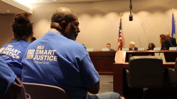 ACLU-CT Smart Justice leaders sit in the audience as the Criminal Justice Commission hears testimony about the Chief State's Attorney search.