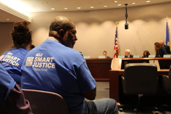 ACLU-CT Smart Justice leaders sit in the audience as the Criminal Justice Commission hears testimony about the Chief State's Attorney search.