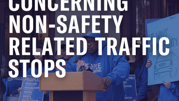 On a faded photo of Anderson speaking in front of the Capitol, the following text appears in white: "H.B. 7132: An Act Concerning Non-Safety Related Traffic Stops."