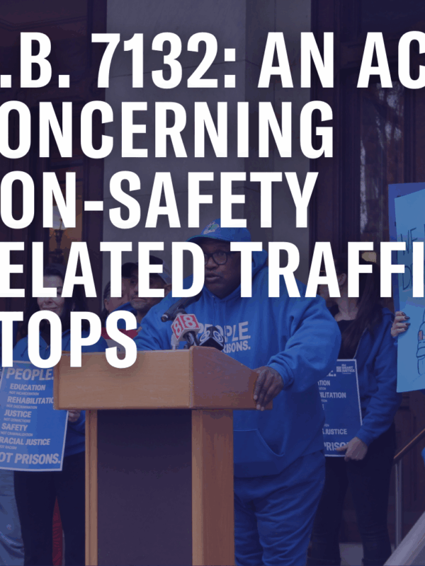 On a faded photo of Anderson speaking in front of the Capitol, the following text appears in white: "H.B. 7132: An Act Concerning Non-Safety Related Traffic Stops."
