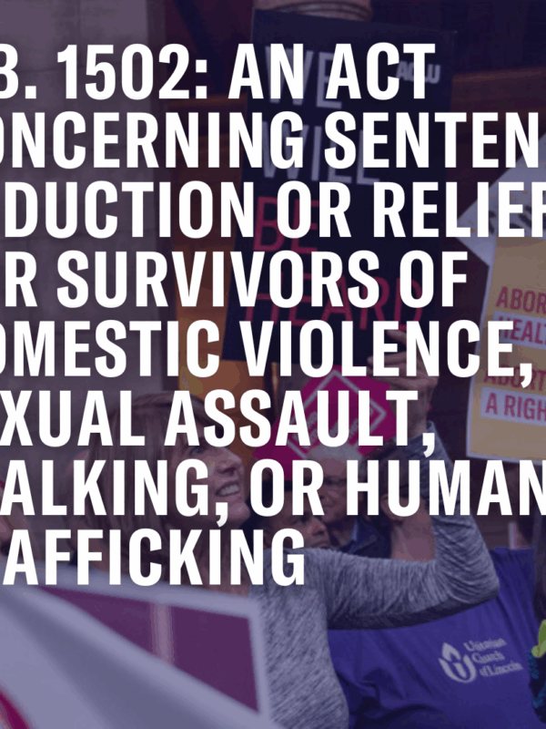 In front of a faded photo of people at a reproductive justice rally, the following text appears in white: "S.B. 1502: AN ACT CONCERNING SENTENCE REDUCTION OR RELIEF FOR SURVIVORS OF DOMESTIC VIOLENCE, SEXUAL ASSAULT, STALKING, OR HUMAN TRAFFICKING"
