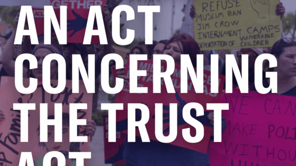 On a faded photo of people rallying in support of immigrant communities, the following text appears in white: "H.B. 7212: An Act Concerning the Trust Act."