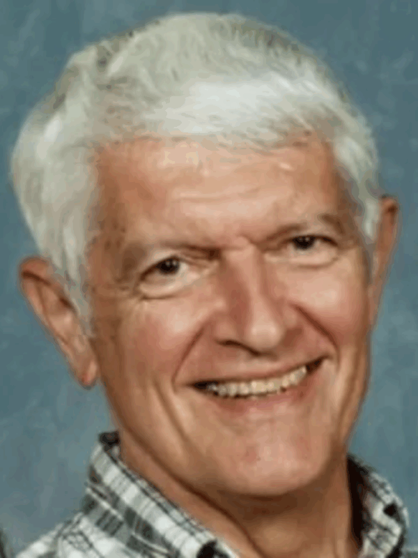Don Neal, an older gentleman with white hair, is smiling at the camera.