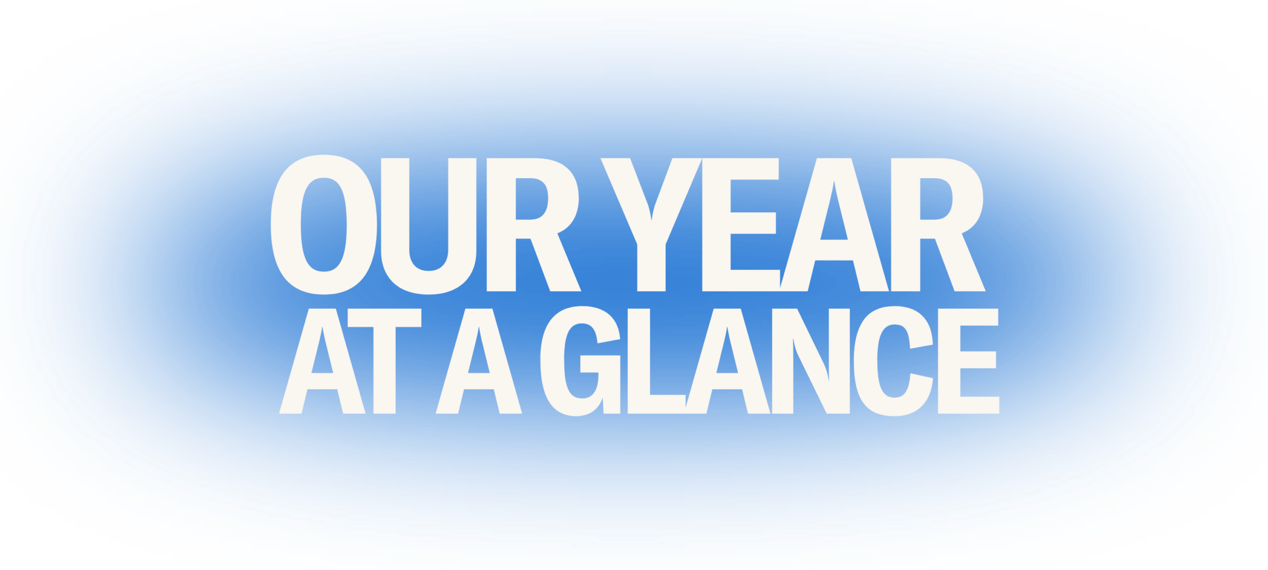 On a transparent background, a blue gradient circle is in the middle. In the middle of the gradient circle is the following text in white: "OUR YEAR AT A GLANCE"