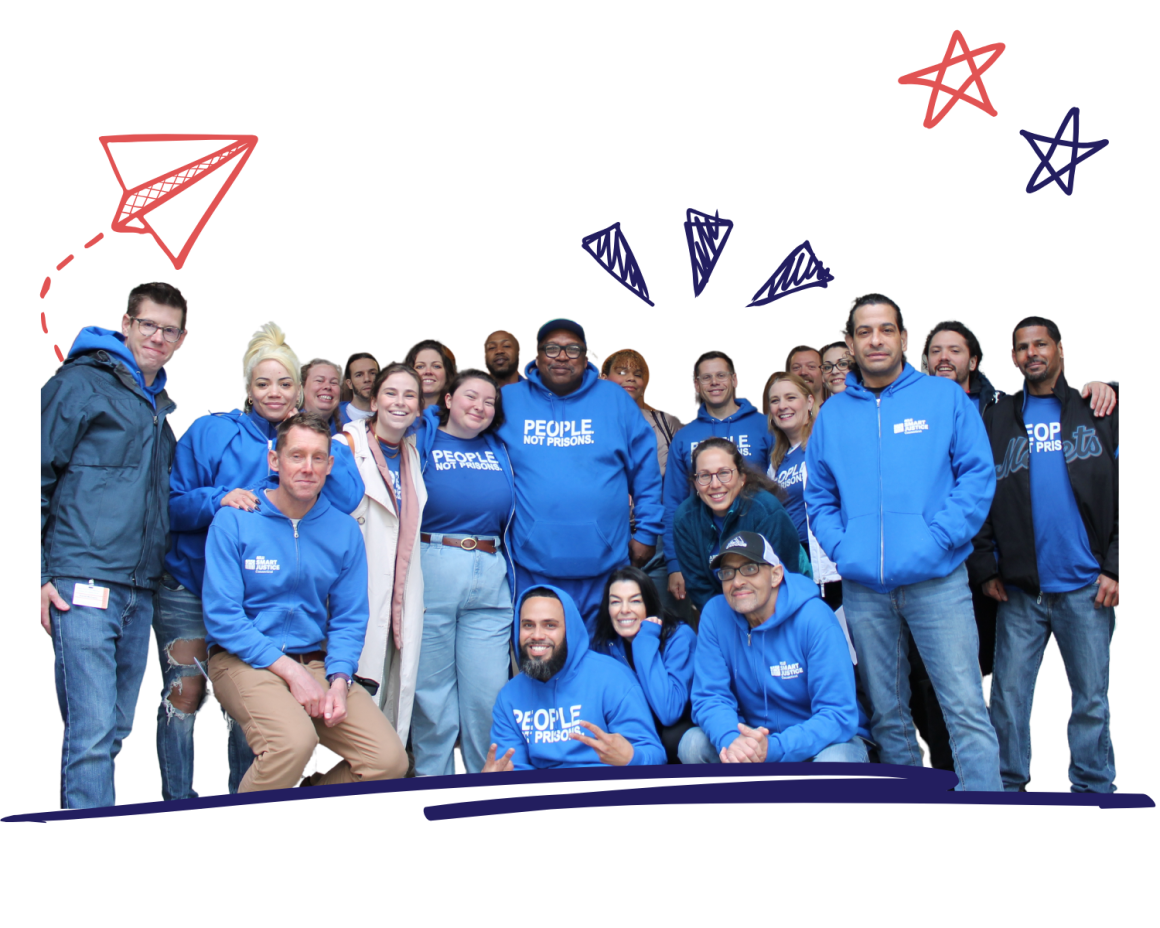  the staff of the ACLU of CT is standing and smiling at the camera. In the top right corner are two hand drawn stars in red and dark blue, and in the left corner is a red hand drawn airplane like a scrapbook.
