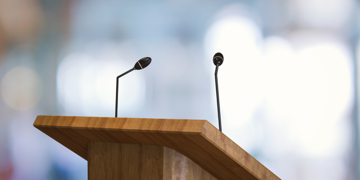 a podium with 2 microphones