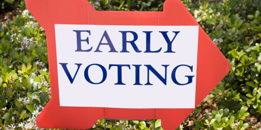 Red arrow right facing right that says early voting in blue font with a white background