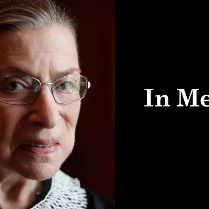 A close up photo of Supreme Court Justice Ruth Bader Ginsburg is on the left. She is looking directly at the camera. On the right, a black box. In the box, "in memory" is written in white letters.