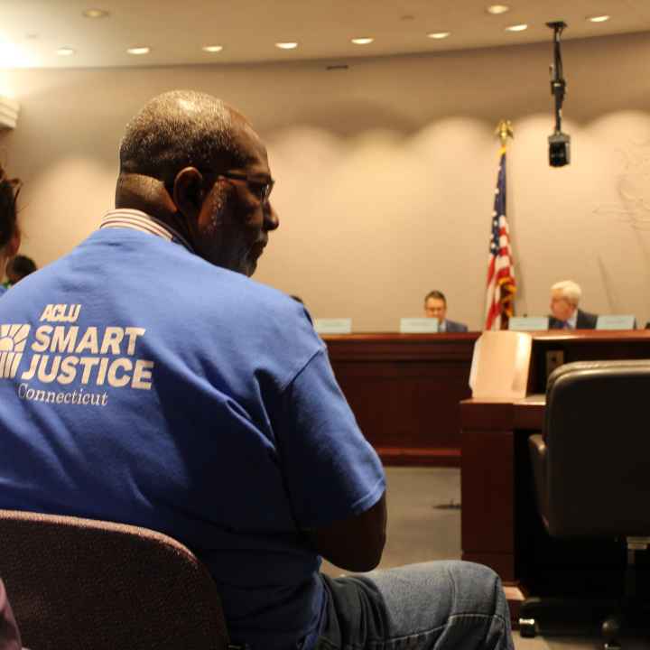 ACLU-CT Smart Justice leaders sit in the audience as the Criminal Justice Commission hears testimony about the Chief State's Attorney search. 